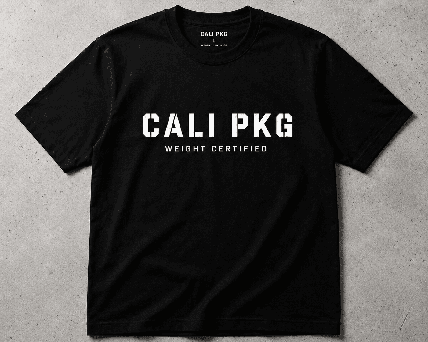 CALI PKG Weight Certified tee — flat lay